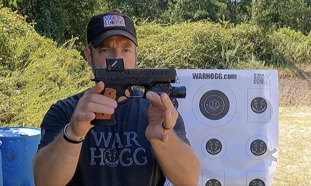 Rick Hogg with the Springfield Armory Echelon with the Sharps Bros grip module and the War HOGG Tactical target in the background.
