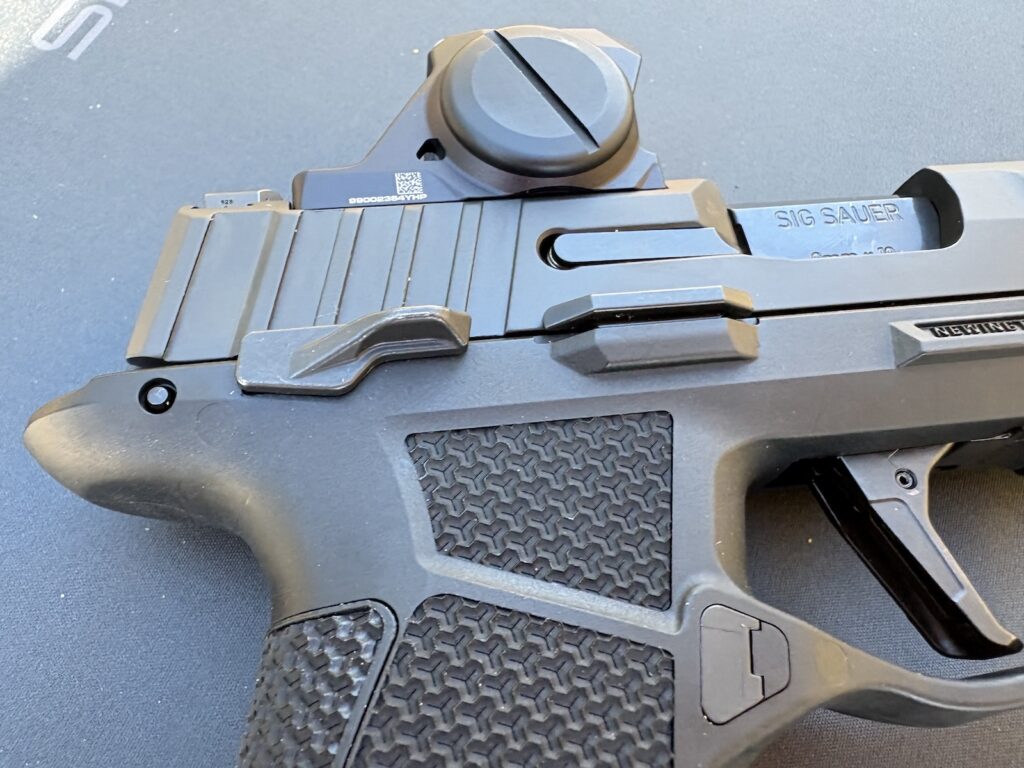 This one has the external safety option. Note how the optic mounts directly to the slide on the P385s.