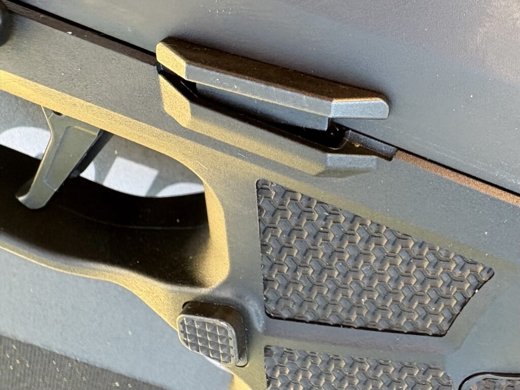 The slide stop lever on the P385 is easy to actuate with a thumb.