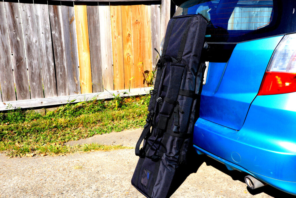Safariland 46-inch double rifle bag standing upright, showing its outer pouches
